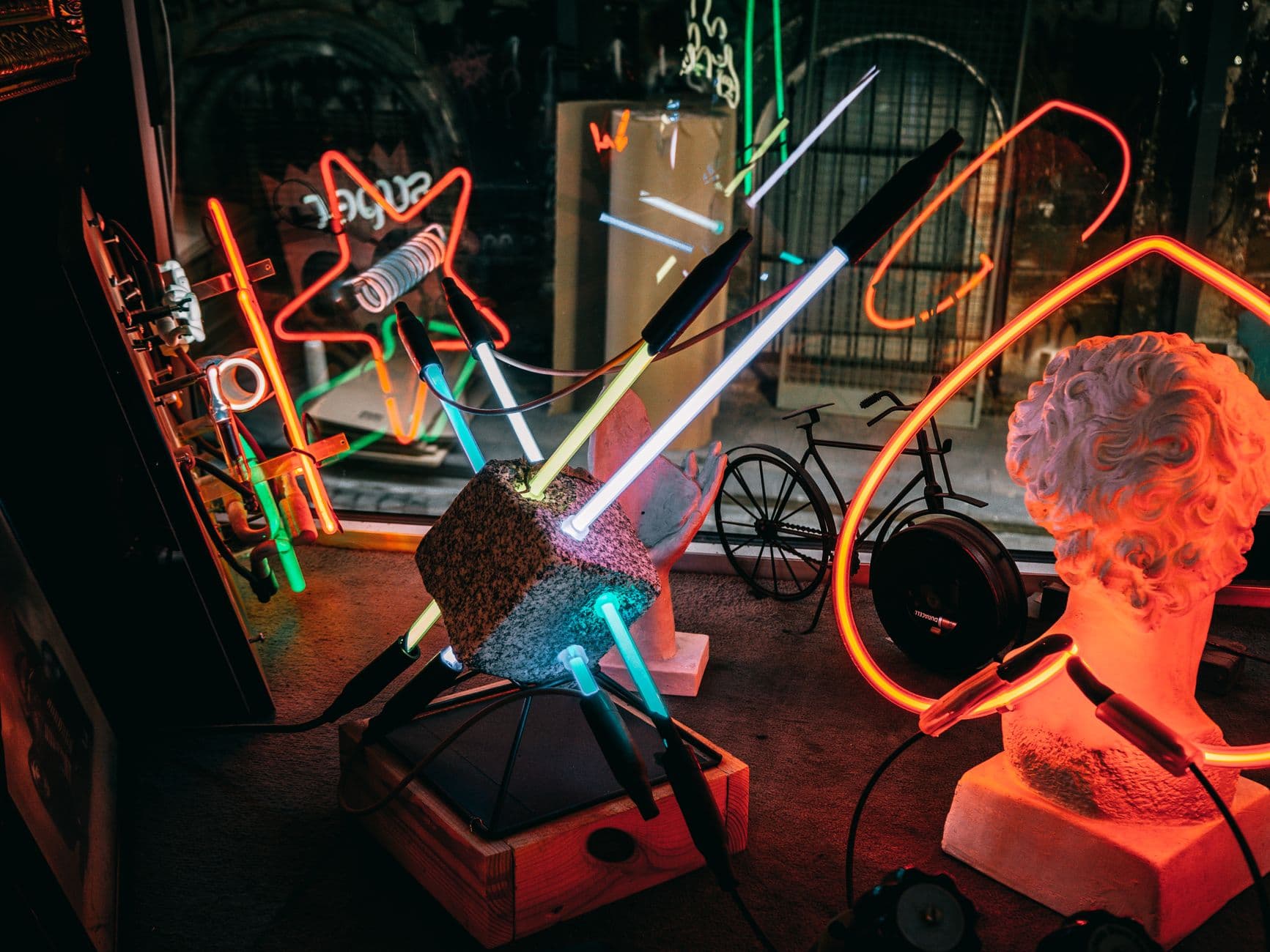 Colorful neon light installation with classical sculpture in Istanbul. Perfect for creative inspiration.